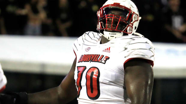Louisville offensive lineman Trevor Reid reacts against UCF during the first half Friday, Sept. 9, 2022, in Orlando, Florida.